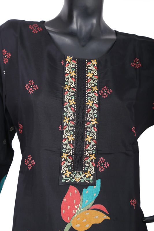 Black kurti with colorful floral embroidery and decorative neckline on mannequin