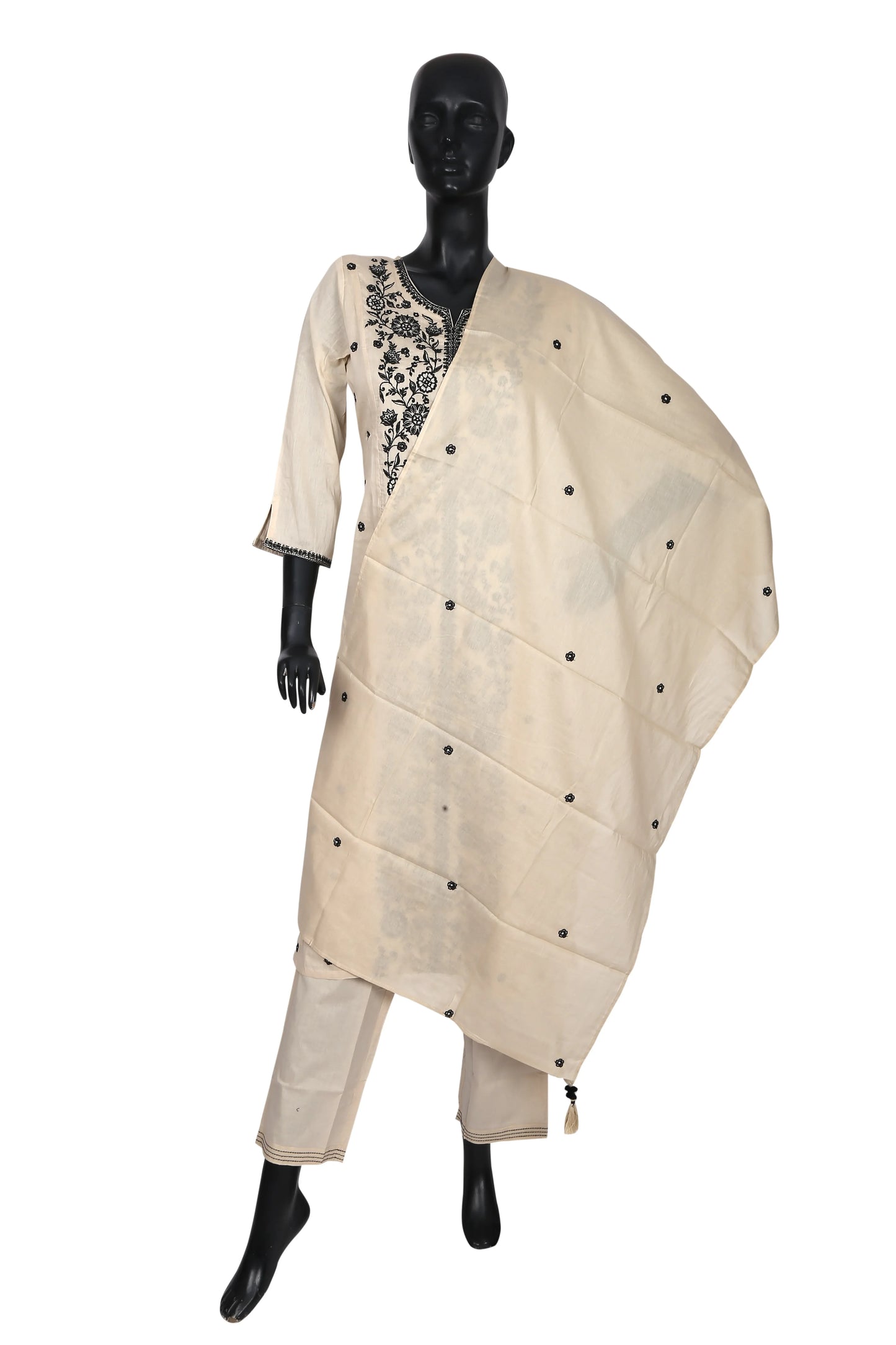 Mannequin in cream salwar suit with black embroidery and matching dupatta