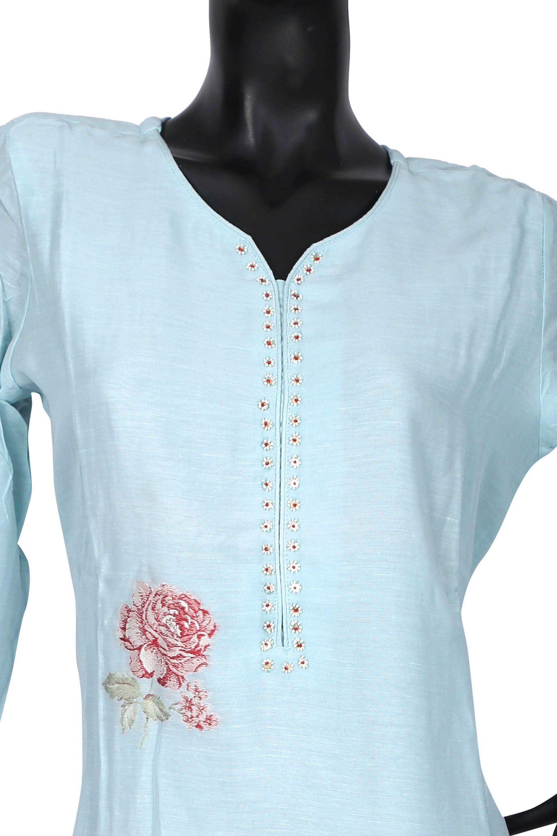 Light blue kurti with floral embroidery and beadwork on mannequin