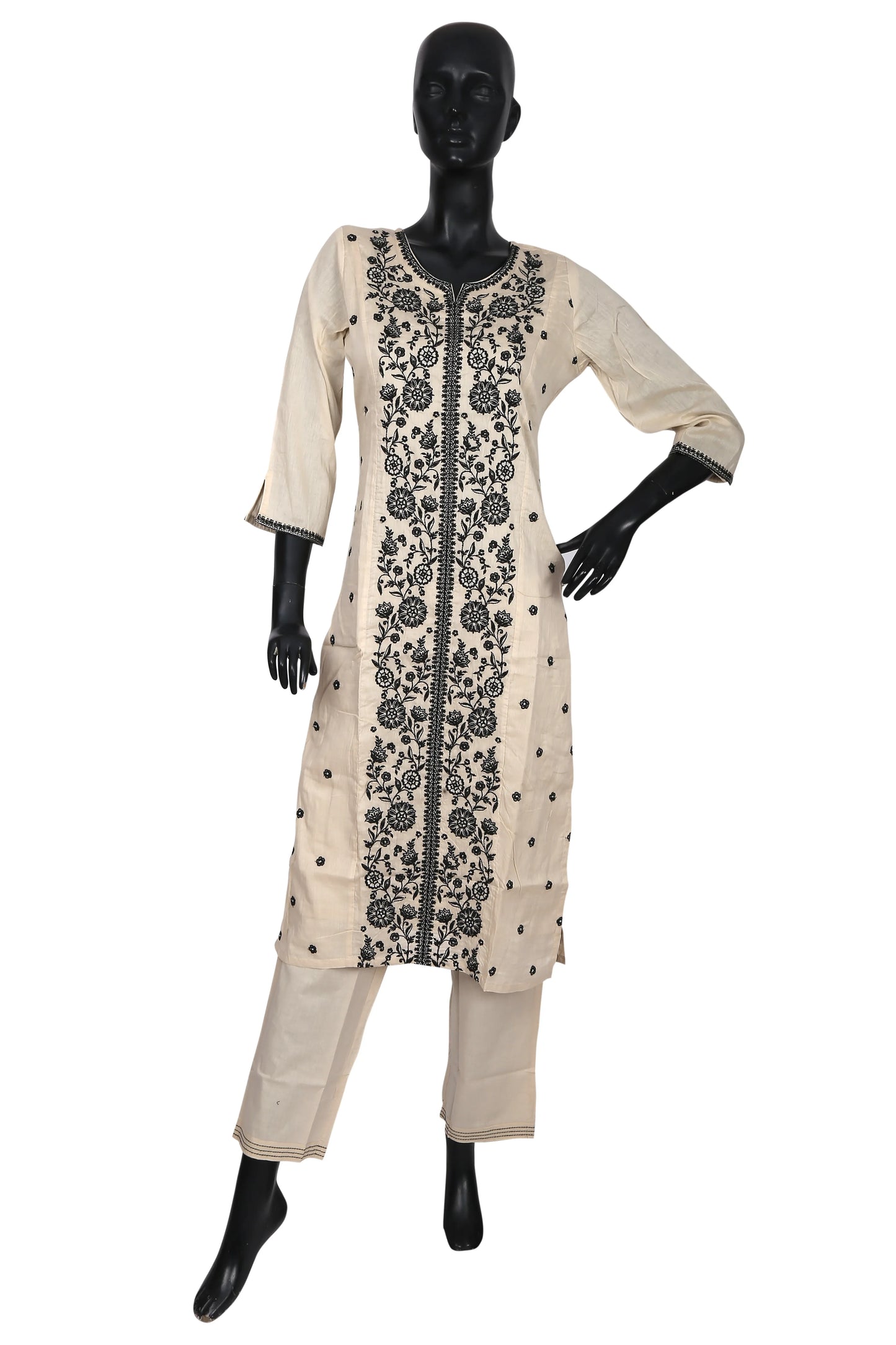 Beige kurta set with black floral embroidery on mannequin, traditional ethnic wear