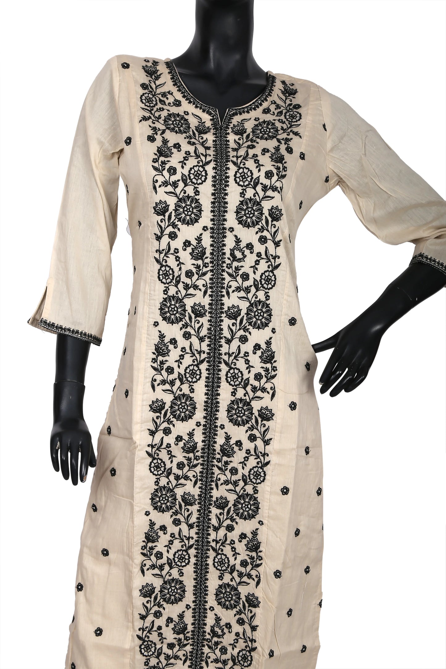 Beige kurta with black floral embroidery, long sleeves, displayed on mannequin
