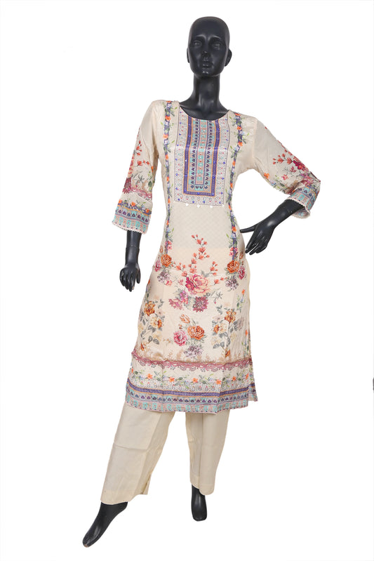 Cream floral embroidered kurta suit with printed accents displayed on mannequin