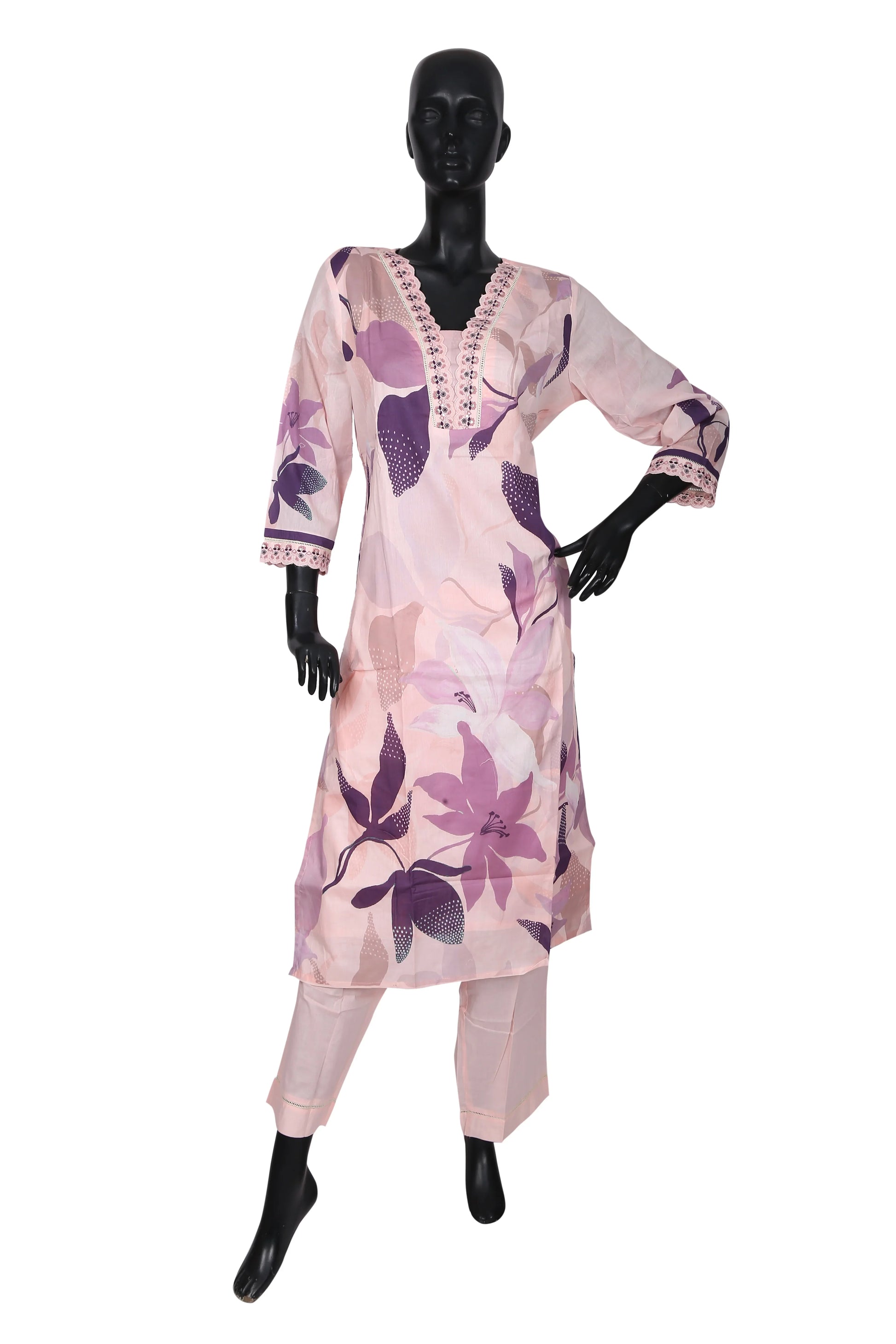 Mannequin wearing a light pink floral printed kurti with matching pants