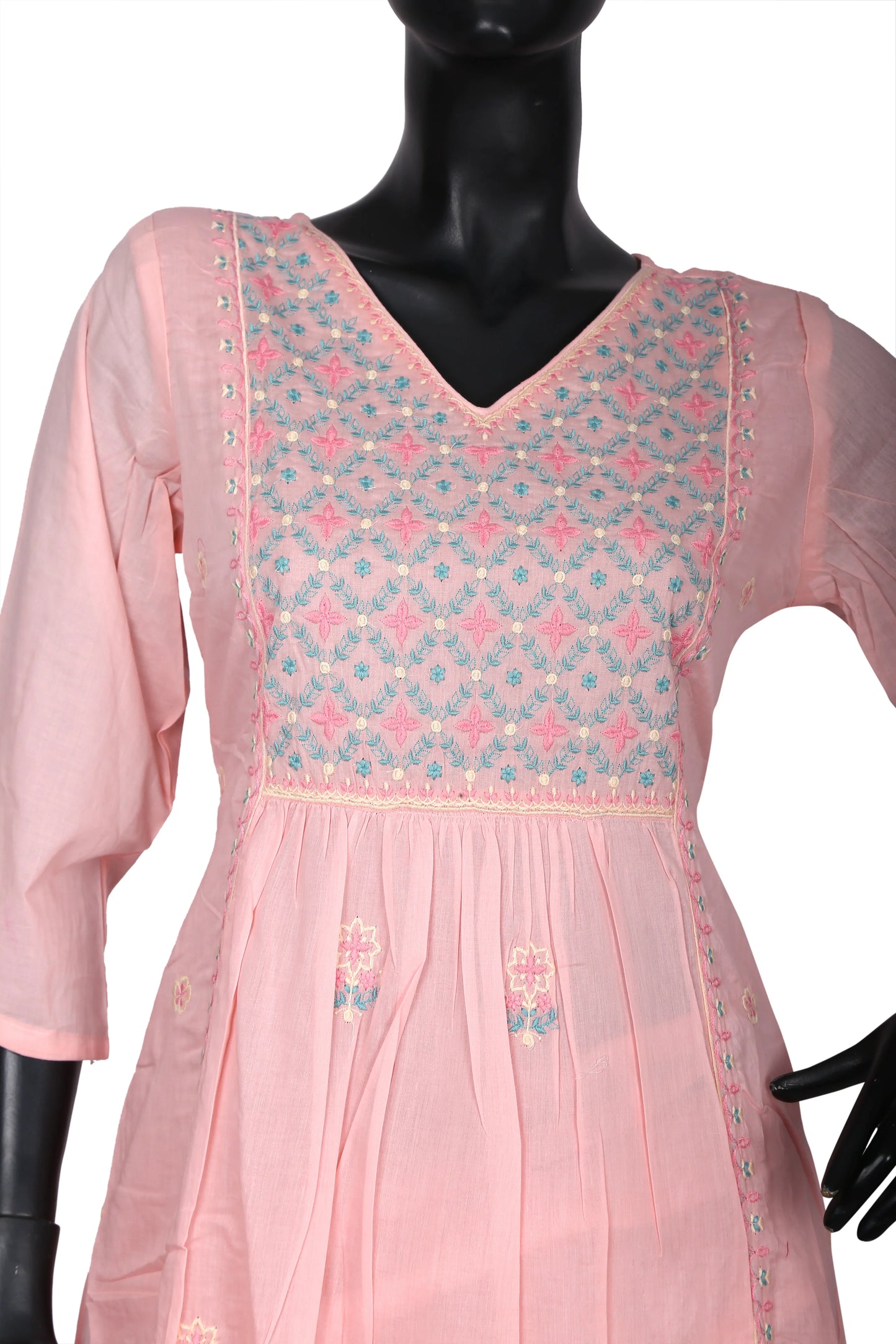 Light pink embroidered kurti with floral threadwork and V-neck on mannequin