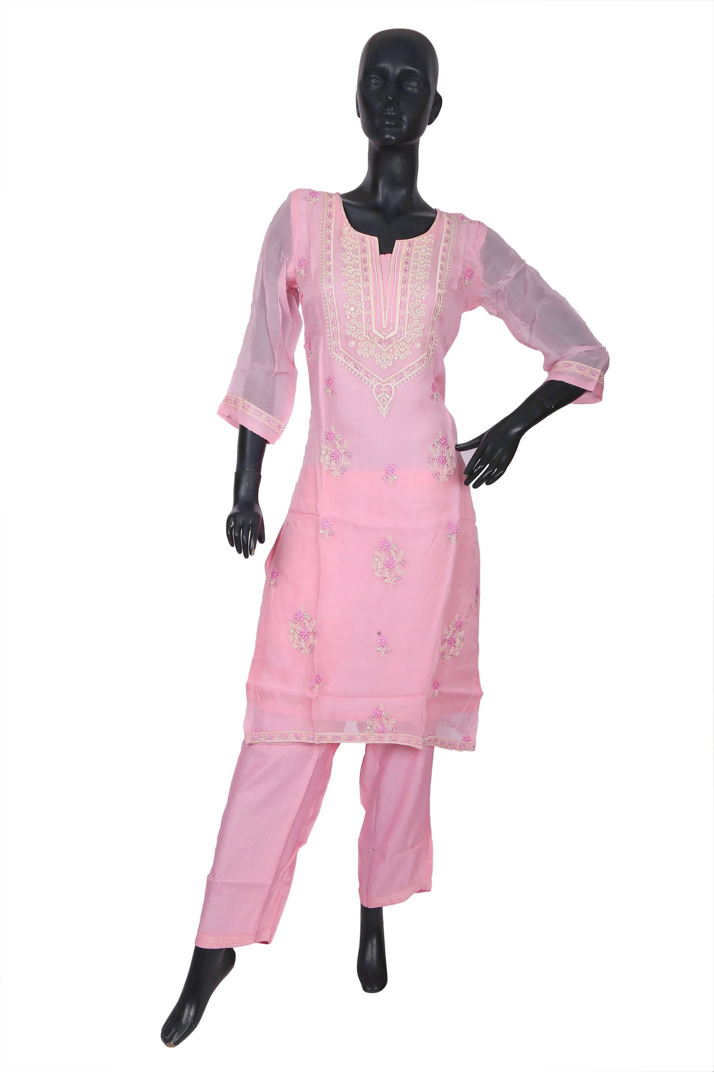 Mannequin in light pink embroidered kurta set with sheer sleeves and matching pants