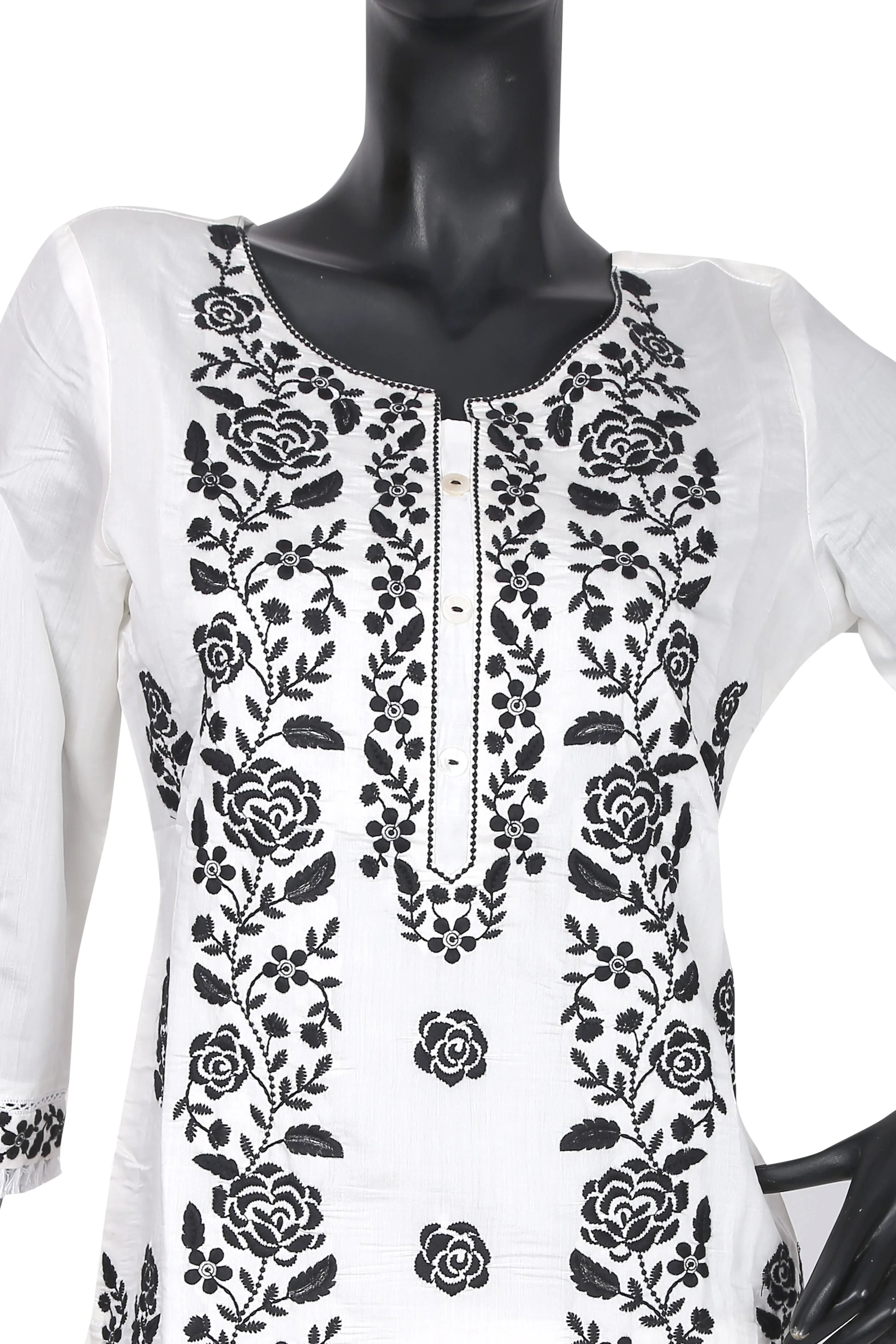 White kurti with black floral embroidery on mannequin, front view, buttoned neckline