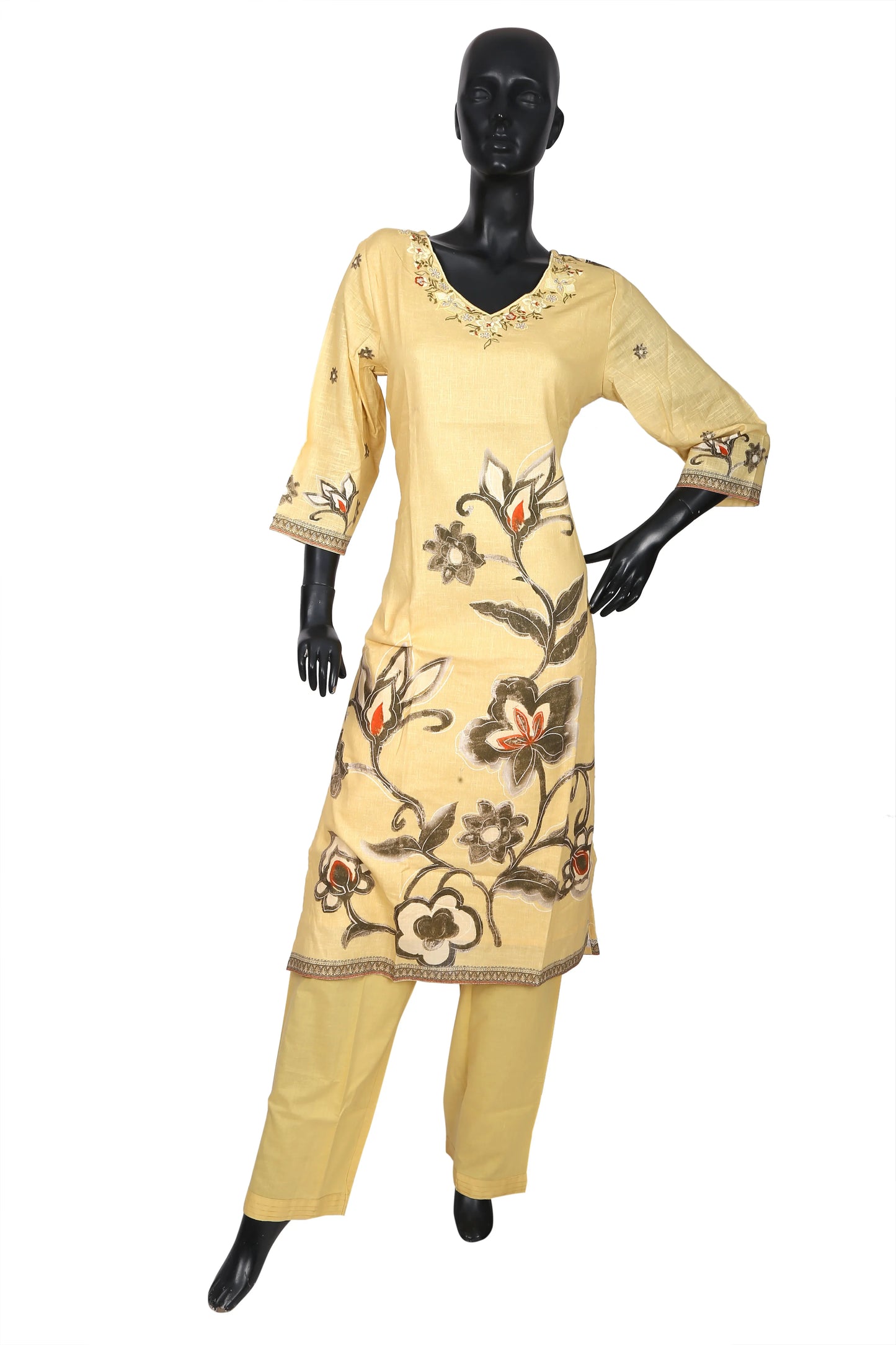 Yellow embroidered kurti and pants set on mannequin, floral ethnic design